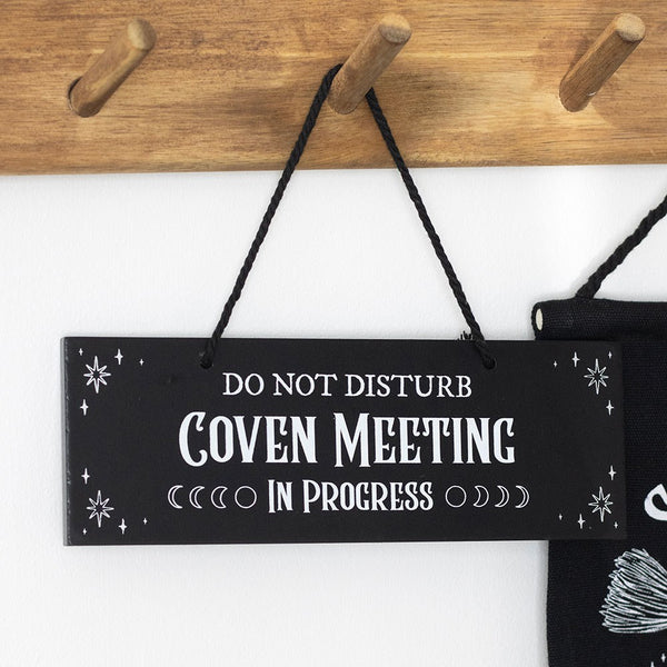 Coven Meeting skilti